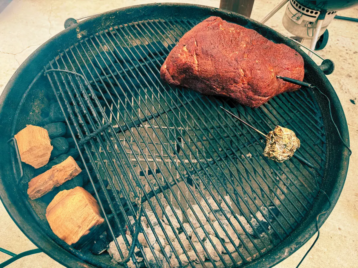 pork butt on the smoker starting to cook