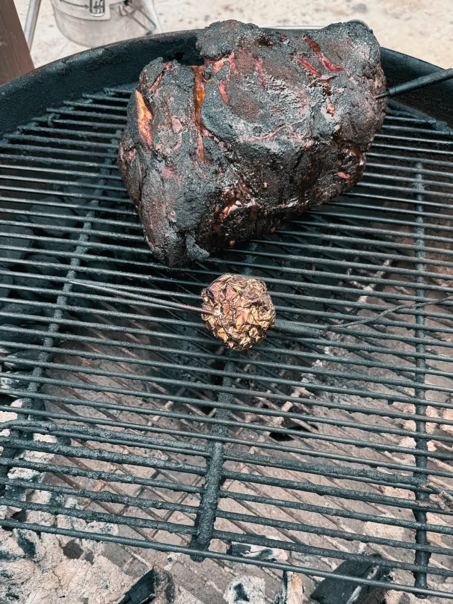 smoked pork butt with nice bark on the smoker